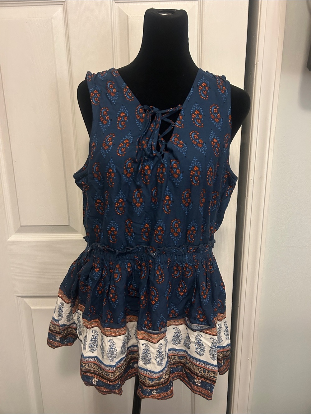 Maurices Navy Sleeveless Lace-Up Peplum Tunic with Rust and Cream Border